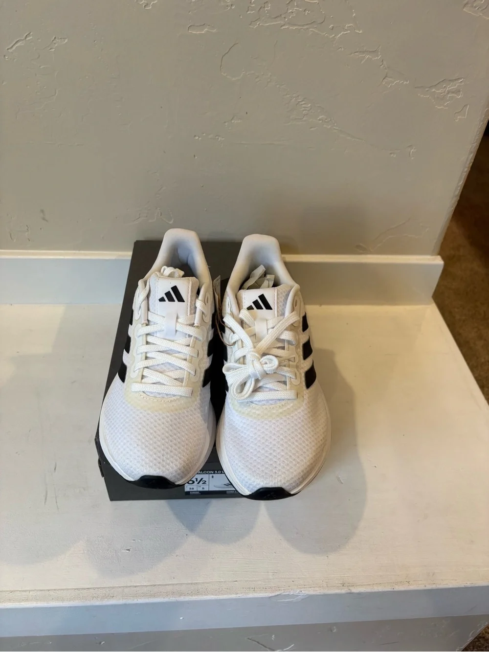 Adidas Women’s White Sneakers with Black Stripes